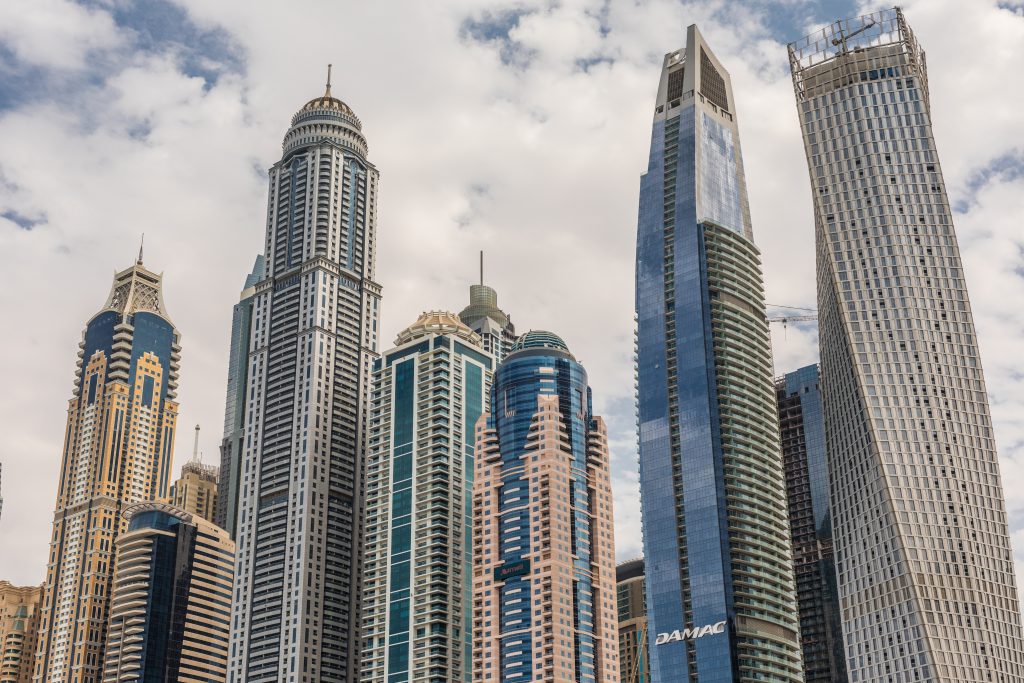 Dubai, United Arab Emirates - October, 2018: and canal in Dubai Marina with luxury skyscrapers around